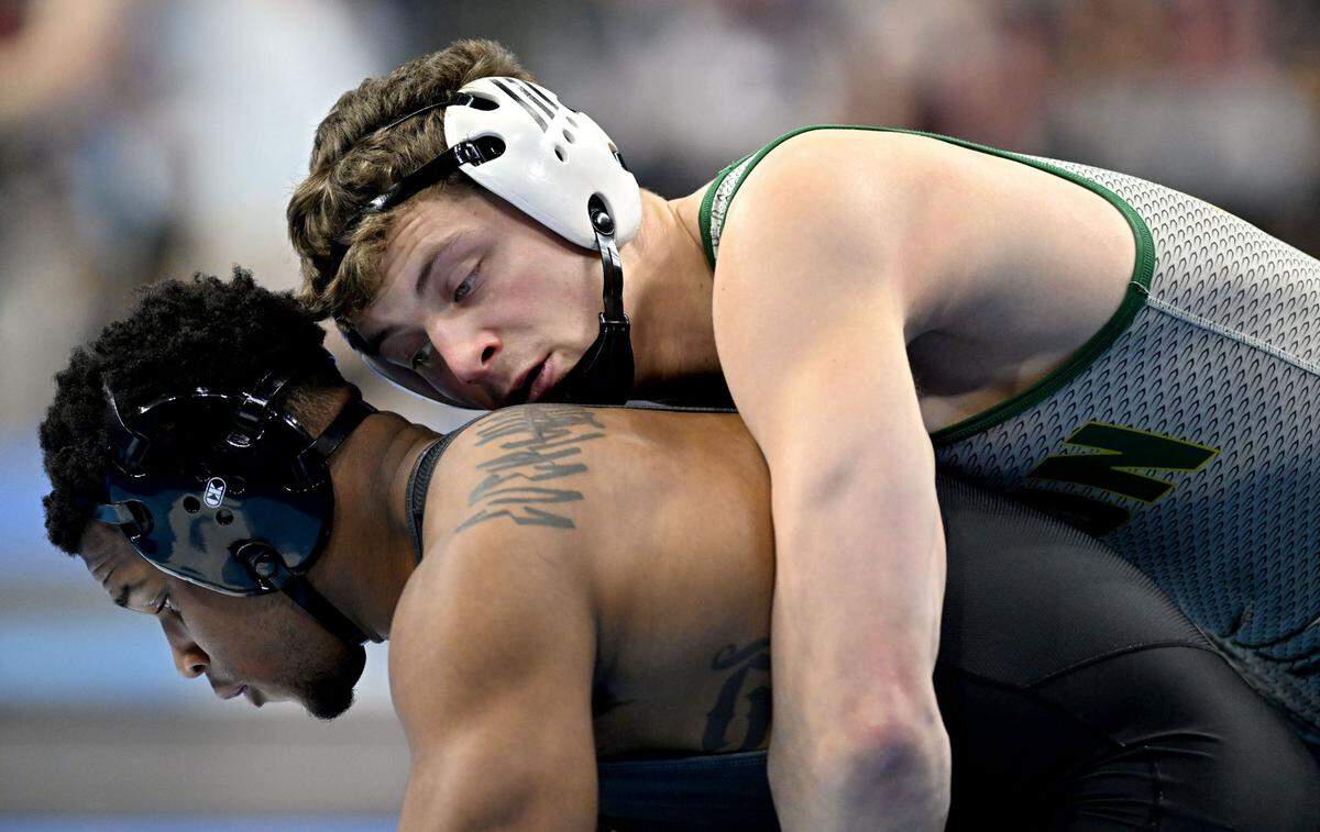 George Mason’s Malachi DuVall faces Iowa’s Gabe Arnold in the 184-pound bout during the 2025 NCAA Wrestling Championships in Philadelphia on Friday, March 21, 2025.