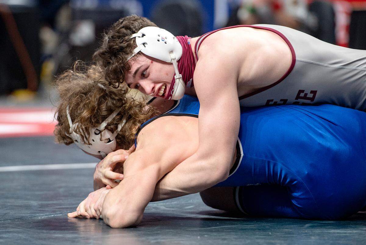 State College’s Lance Urbas controls Nazareth’s Sonny Sasso in a 172 lb bout at the PIAA 3A wrestling championships on Saturday, March 13, 2021 at the Hershey Giant Center. Urbas won by decision, 3-1.