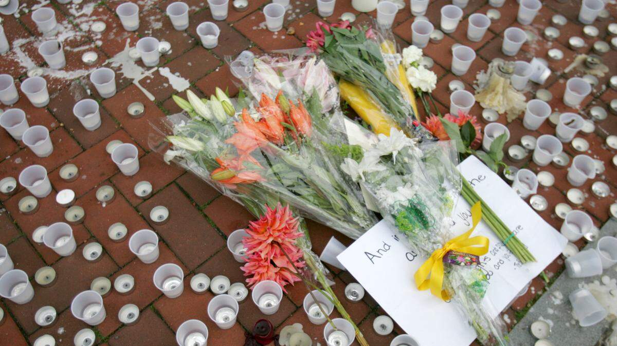 Flowers were placed in makeshift memorial for Joe Dado along Pollock Road on Tuesday, September 22, 2009. CDT/Christopher Weddle