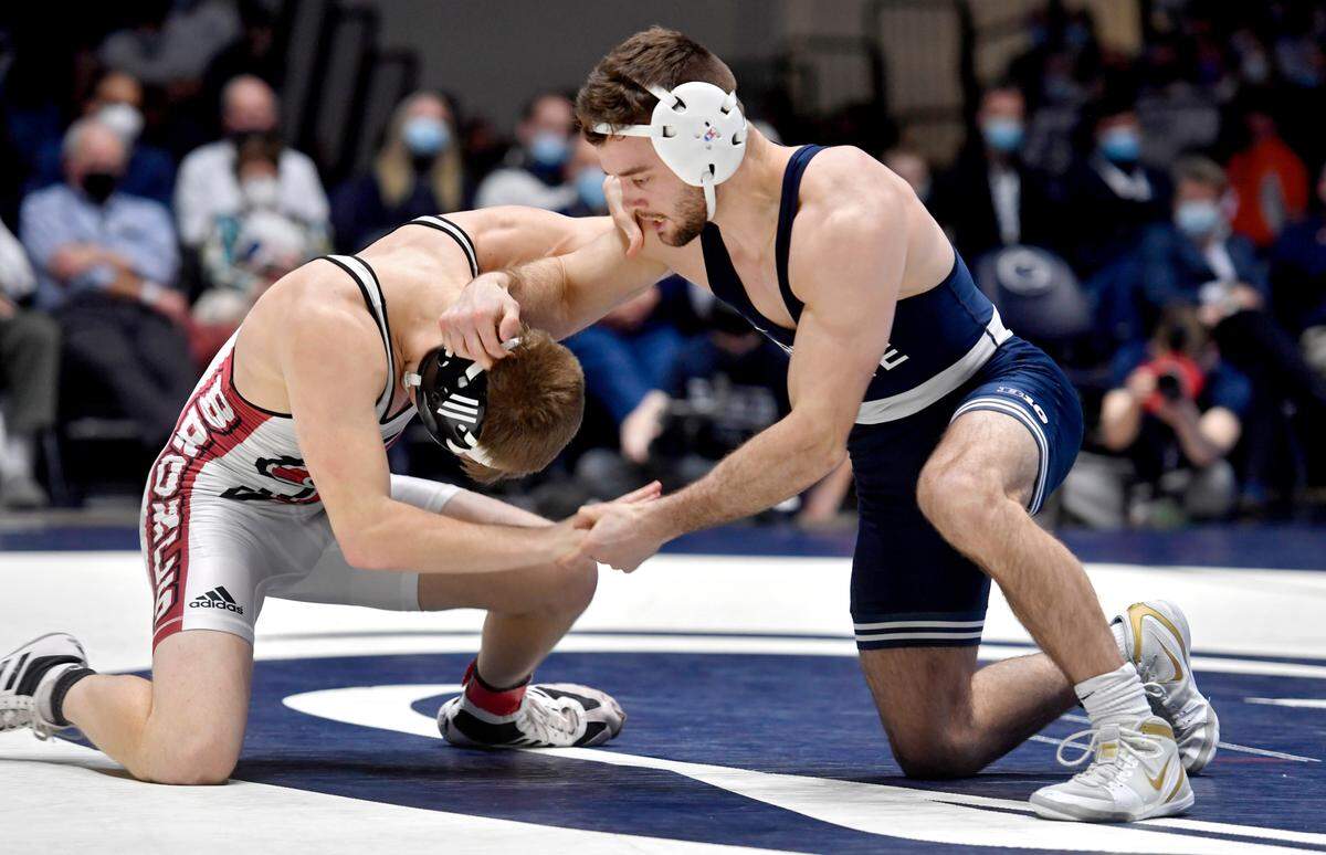 Penn State’s Brady Berge wrestles Rider’s Cole McComas in the 157 lb bout of the match on on Sunday, Feb. 20, 2022.