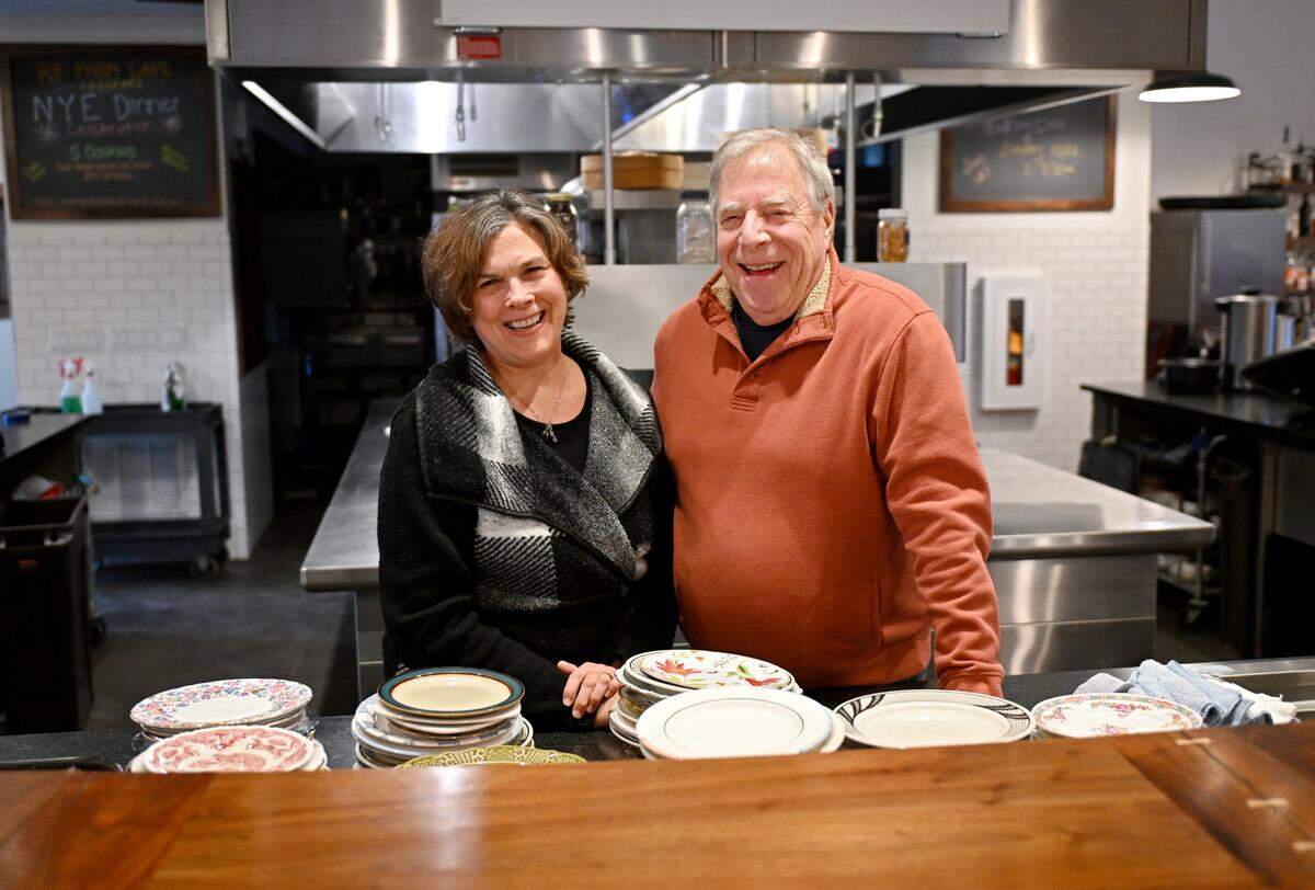Monica and Duke Gastiger in the open kitchen at RE Farm Cafe on Jan. 3, 2025.