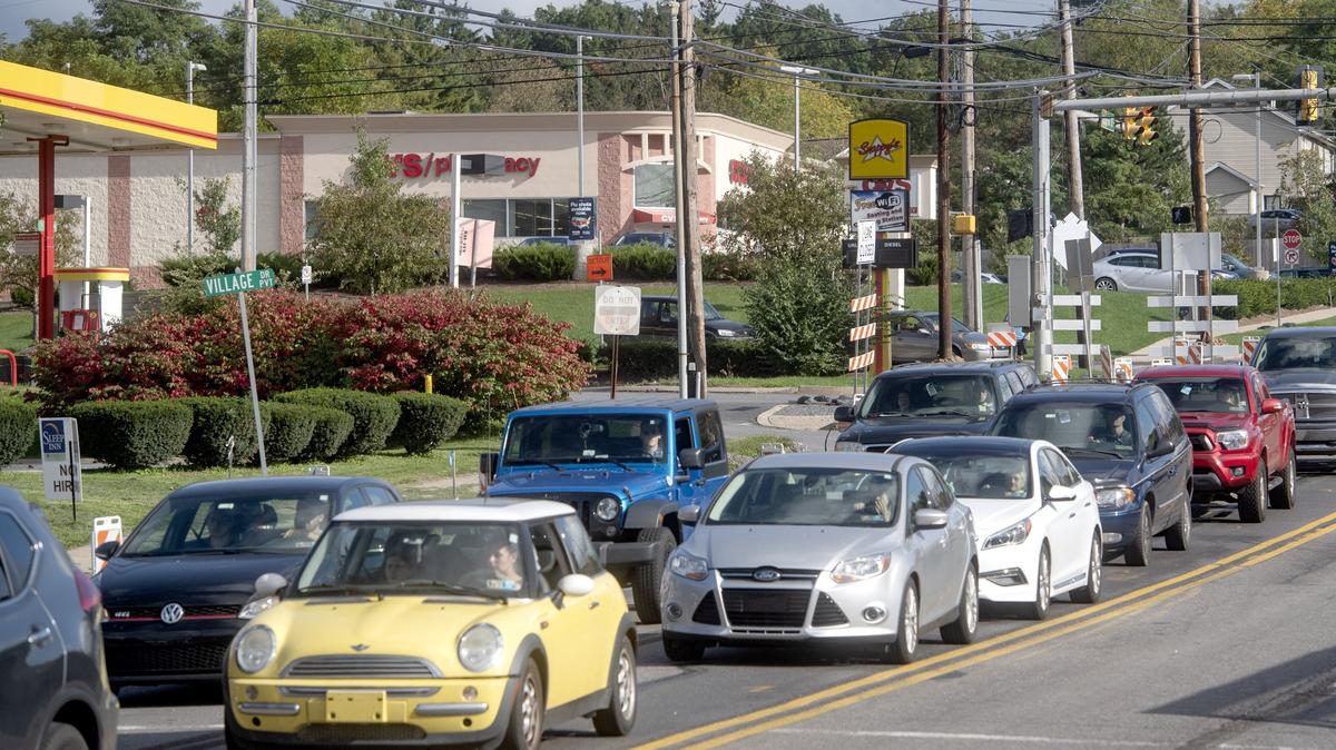 Construction continues on North Atherton Street on Wednesday, Oct. 10, 2018, causing heavy traffic and hardships for businesses.