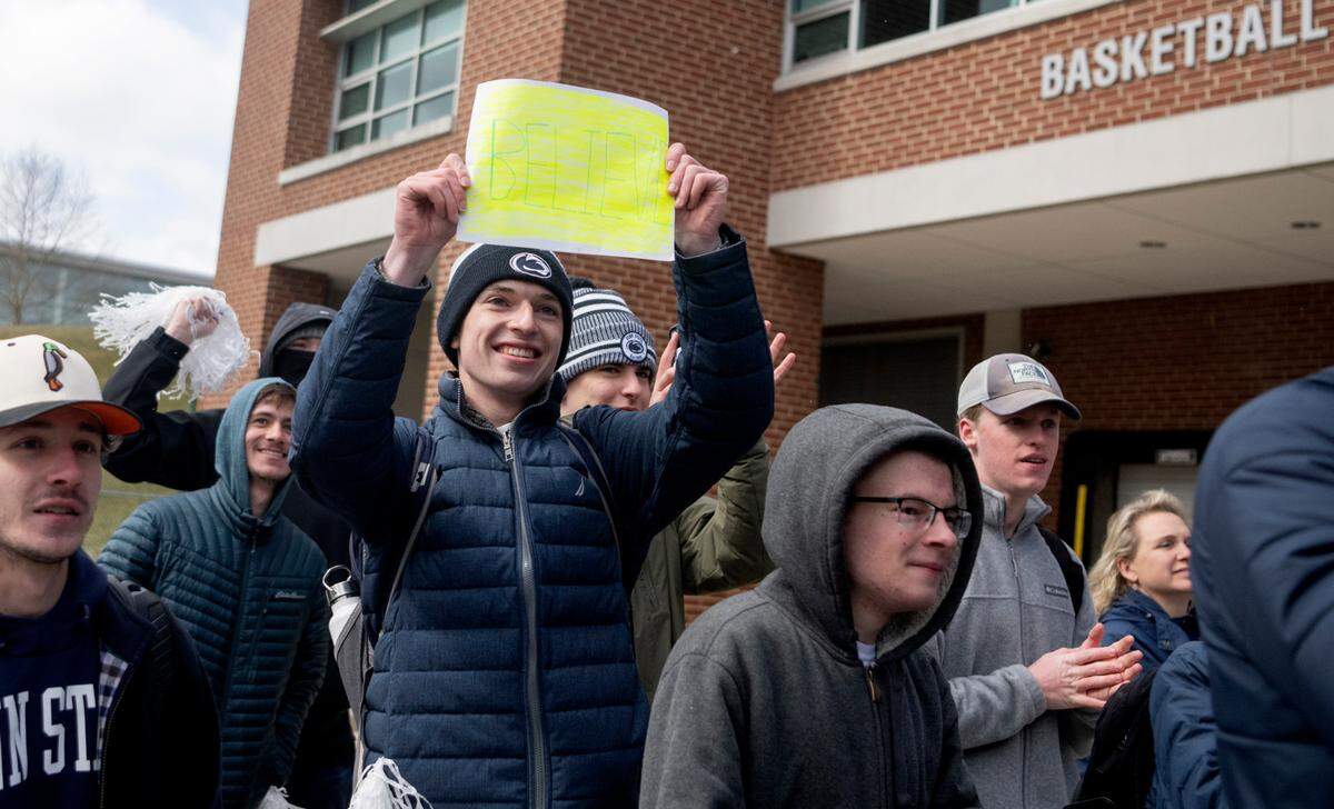 Penn State men’s basketball fans cheer on the team as they leave for the NCAA Tournament on Tuesday, March 14, 2023.