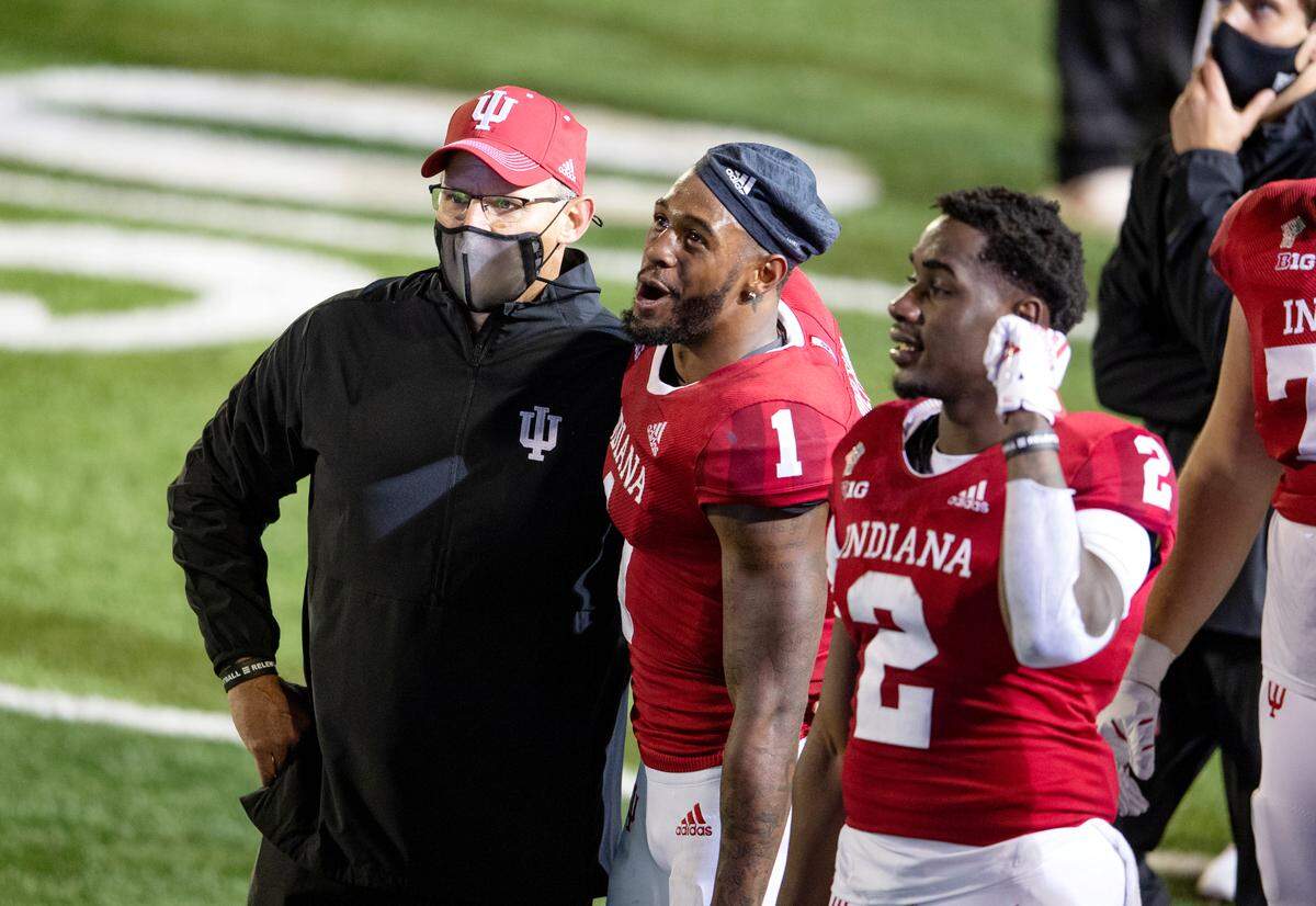 Indiana football coach Tom Allen and his players started to celebrate as the final play in overtime was reviewed to give the Hoosiers a win over Penn State on Oct. 24, 2020.
