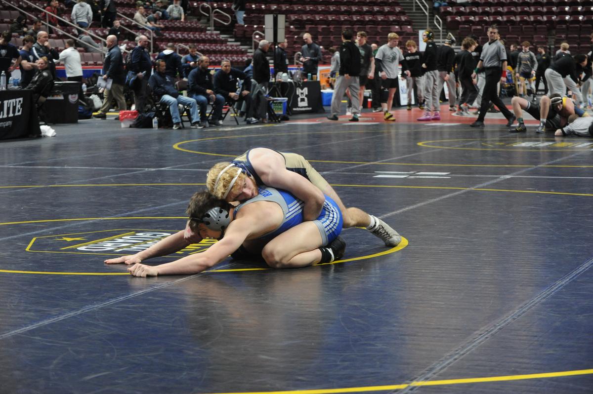 Bald Eagle Area’s Cameron Dubbs controls Reynolds’ Louie DeJulia in their 172-pound bout of the Eagles’ 27-25 loss on Friday in the PIAA Class 2A dual championships consolation first round match. Dubbs beat DeJulia, 7-3.