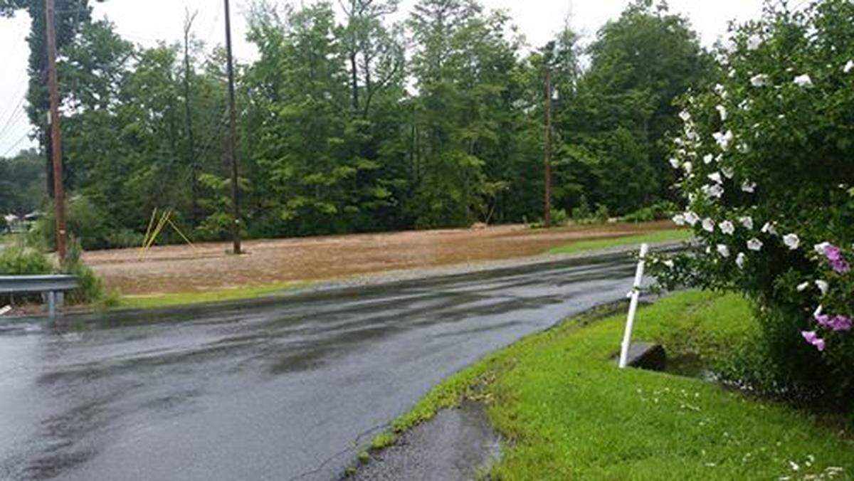 Debbie Sherk Smoyer took these photos from the corner of Dix Run Road and Old Route 220, just South of Unionville.  The utility pole in the water was swaying.