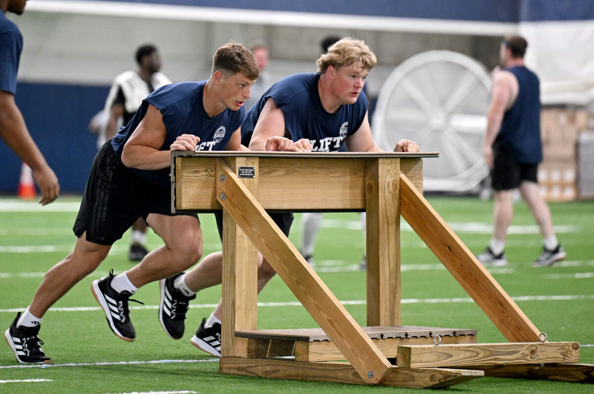 Penn State linebacker Cael Brezina and a teammate push the sled during Lift For Life on Wednesday, July 1, 2026.