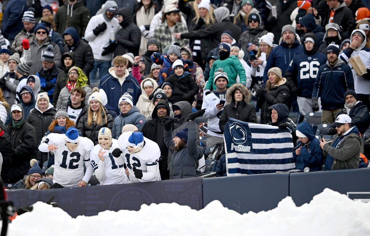 Penn State fans cheer during the Pinstripe Bowl at Yankee Stadium on Saturday, Dec. 27, 2025.  