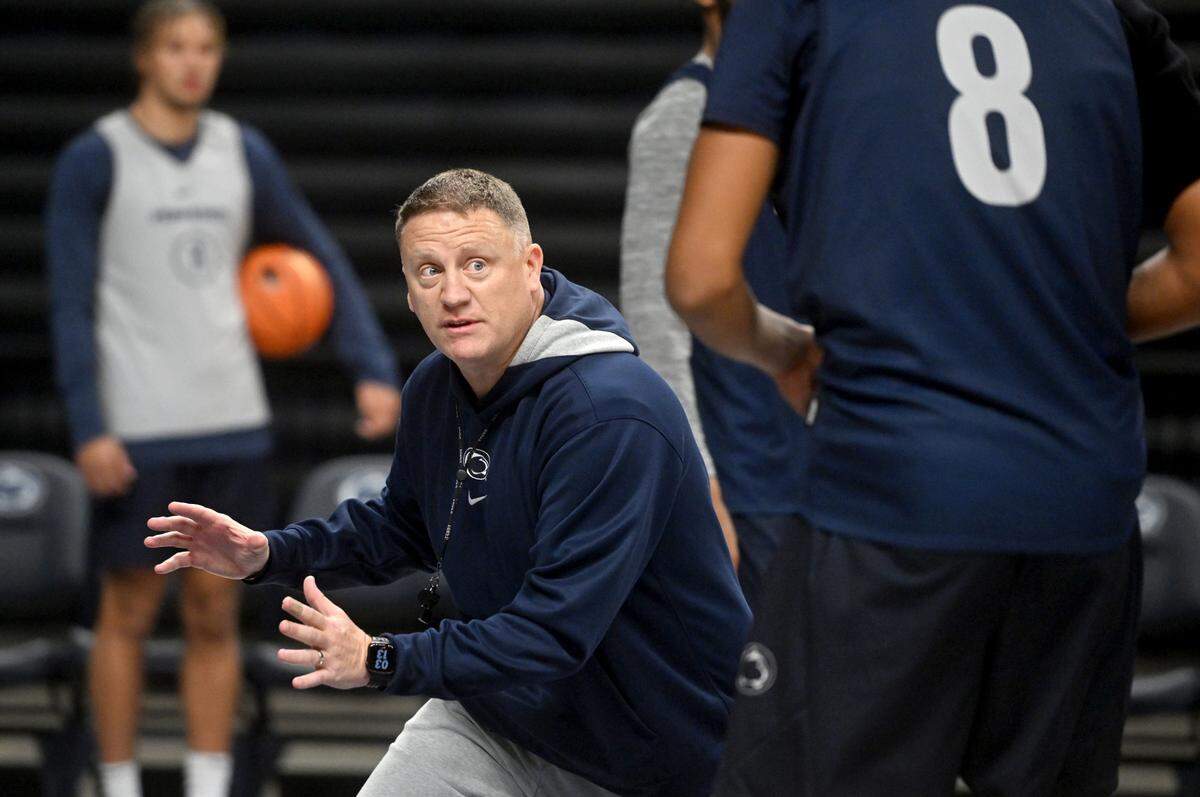 Penn State men’s basketball coach Mike Rhoades explains a technique during practice on Wednesday, Oct. 23, 2024.