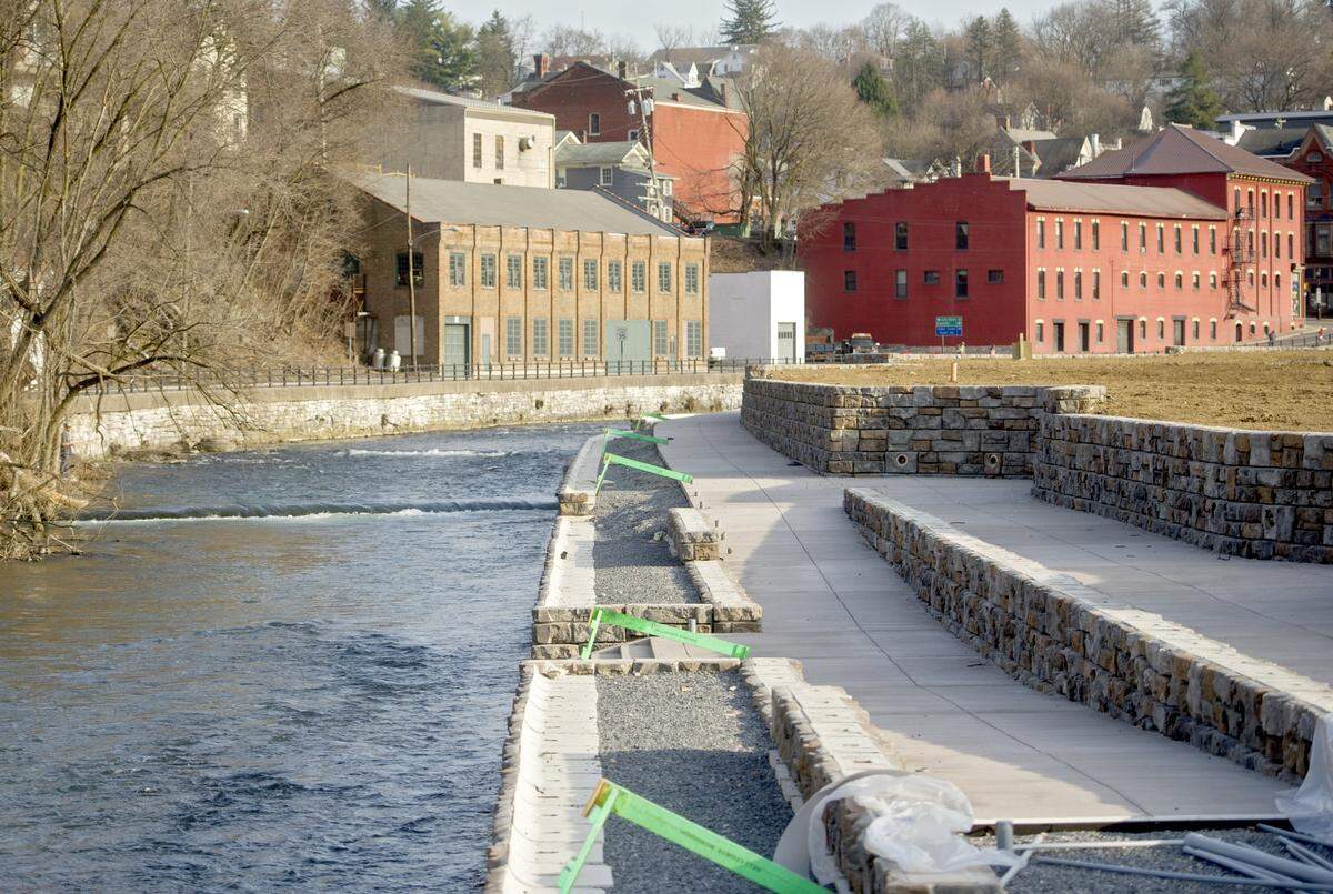 Work continues on the sidewalks for the Bellefonte Waterfront project on March 18, 2016.