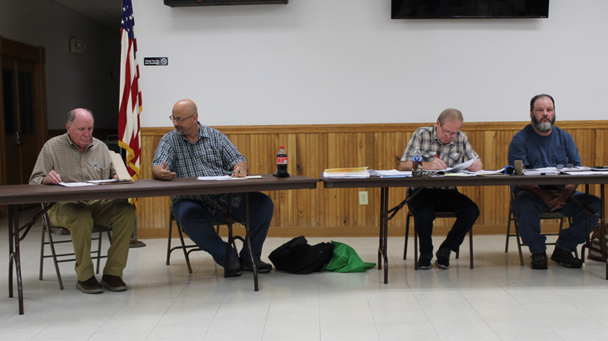 From left, solicitor Louis Glantz, and Marion Township supervisors Orie Hanley, Archie Gettig and Herb Chapman hear from residents at the township’s second public hearing on a potential rezoning.