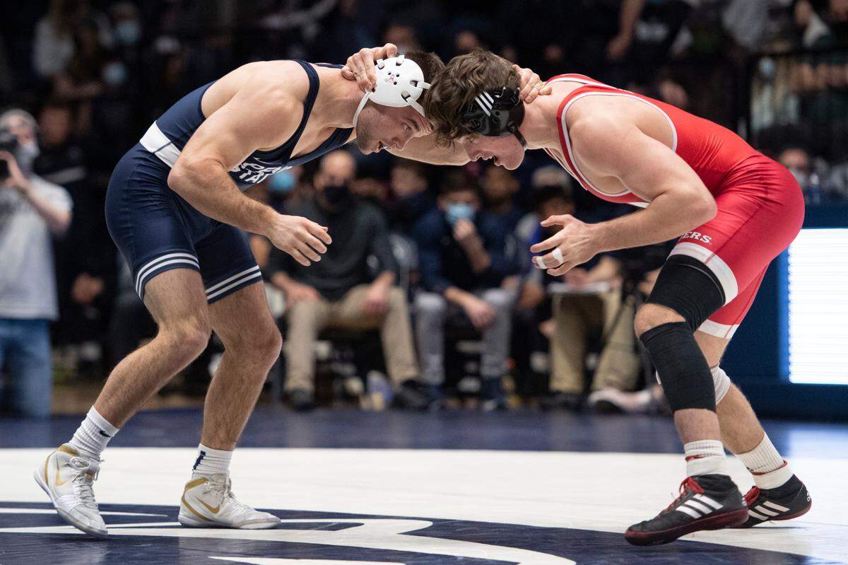 Penn State’s Brady Berge grabs the head of Rutgers’ Andrew Clark during a wrestling dual between Penn State and Rutgers on Sunday, Jan. 16, 2022 at Rec Hall in University Park, Pa. Penn State defeated the Scarlet Knights 27-11.