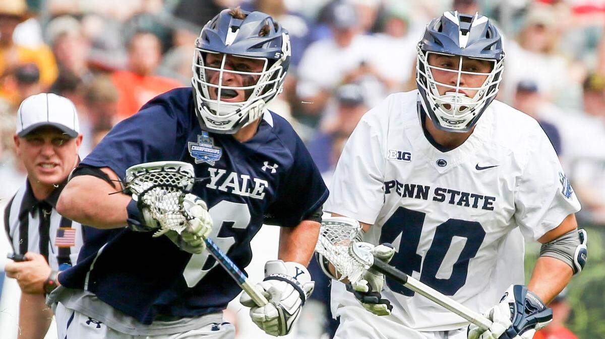 Penn State lacrosse midfielder Gerard Arceri (40) loses a faceoff to Yale’s TD Ierlan (6) during the NCAA semifinal game at Lincoln Financial Field on May 25, 2019.