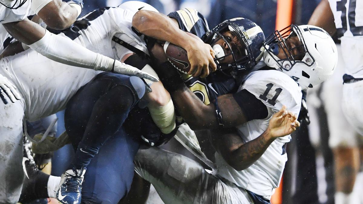 Penn State linebacker Micah Parsons takes down Pitt running back Qadree Ollison during a game Saturday, Sept. 8, 2018 at Heinz Field.