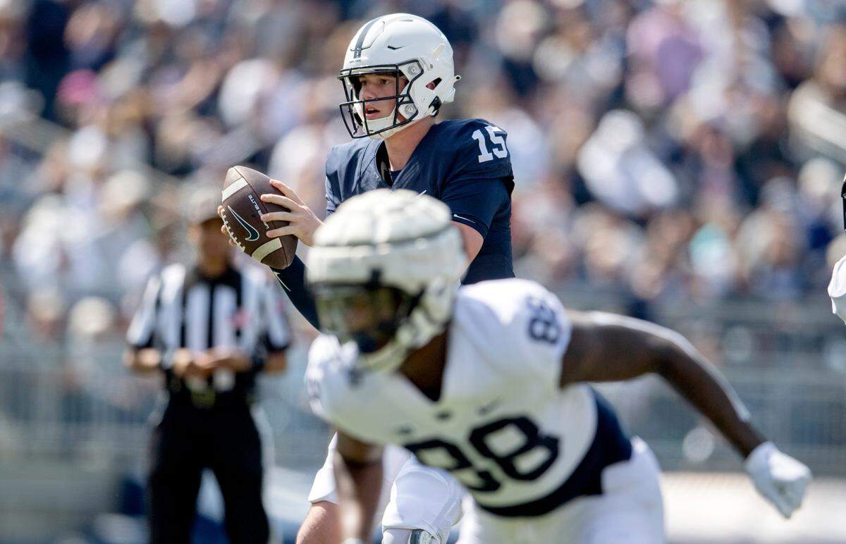 Penn State quarterback Drew Allar gets the snap during the Blue-White game on Saturday, April 23, 2022.