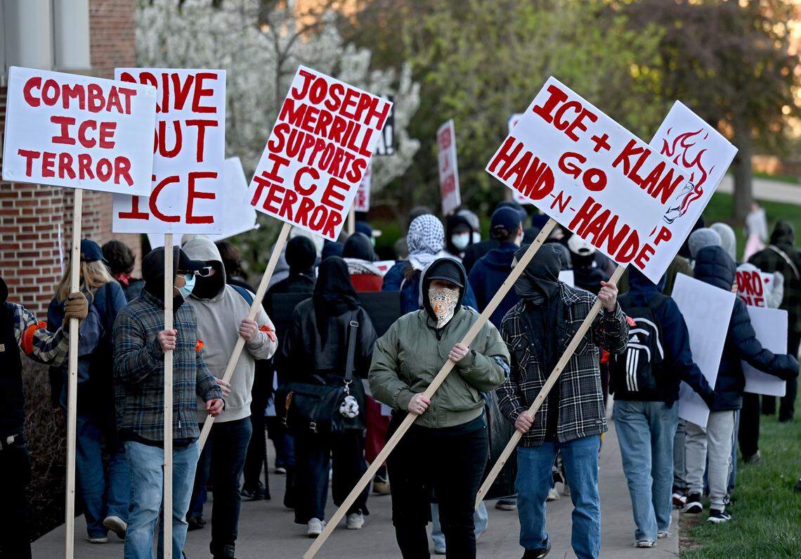 Anti-ICE protesters walk through the Penn State campus on Monday, April 20, 2026.  
