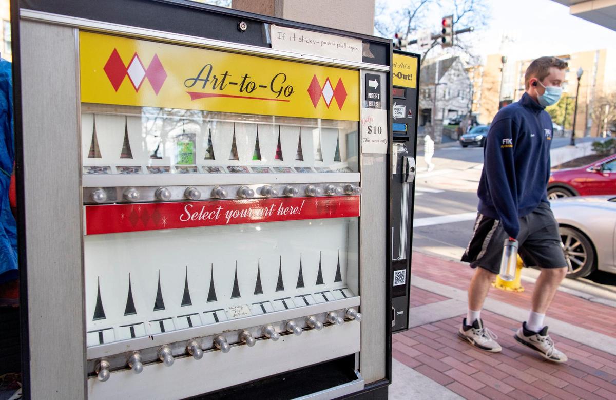 Community members can purchase unique pieces by local artists from the new Art to Go vending machine outside of the 3 Dots on Beaver Avenue in State College.