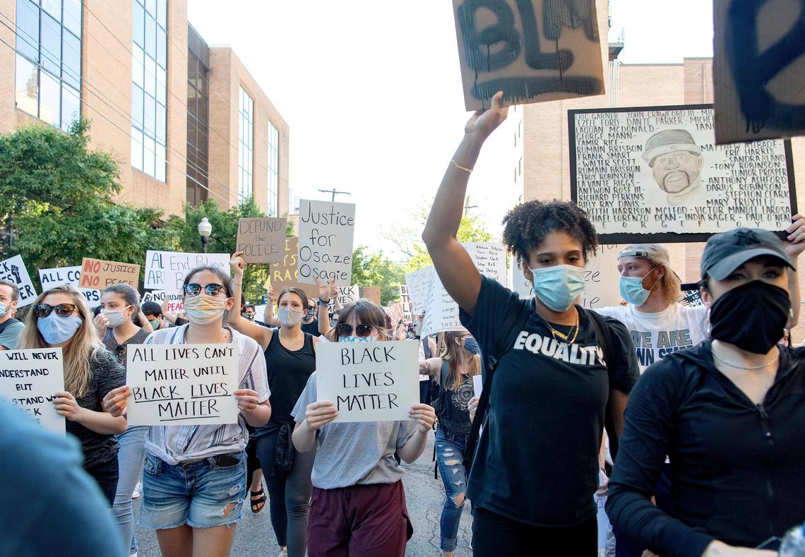 Hundreds of people march down Burrowes Road during a “Justice for Black Lives” protest organized by the 3/20 Coalition on Sunday, June 7, 2020.