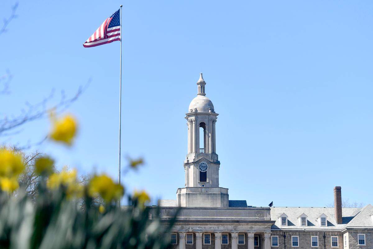 Tulips bloom in front of Penn State’s Old Main on April 6, 2020.
