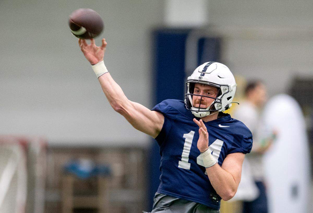 Penn State quarterback Sean Clifford makes a pass during spring football practice on Wednesday, April 20, 2022.