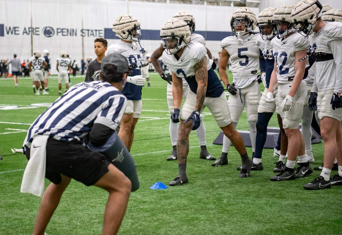 Penn State wide receiver Julian Fleming prepares to run a drill during practice on Tuesday, April 2, 2024.