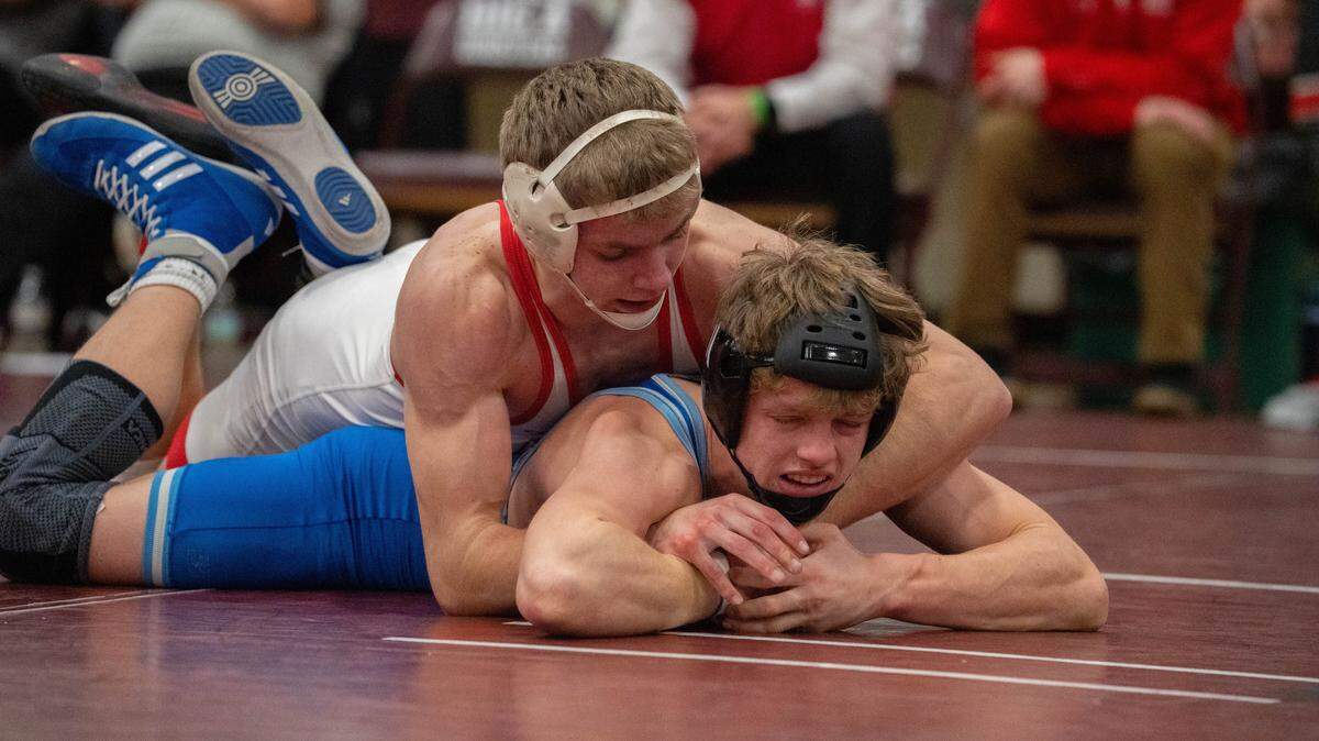Bellefonte's Wyatt Long, top, holds down Central Mountain’s Hayes Donley during the District 6 Class 3A individual championships in the Altoona High School Fieldhouse in Altoona, Pa., on Saturday, Feb. 21, 2026.