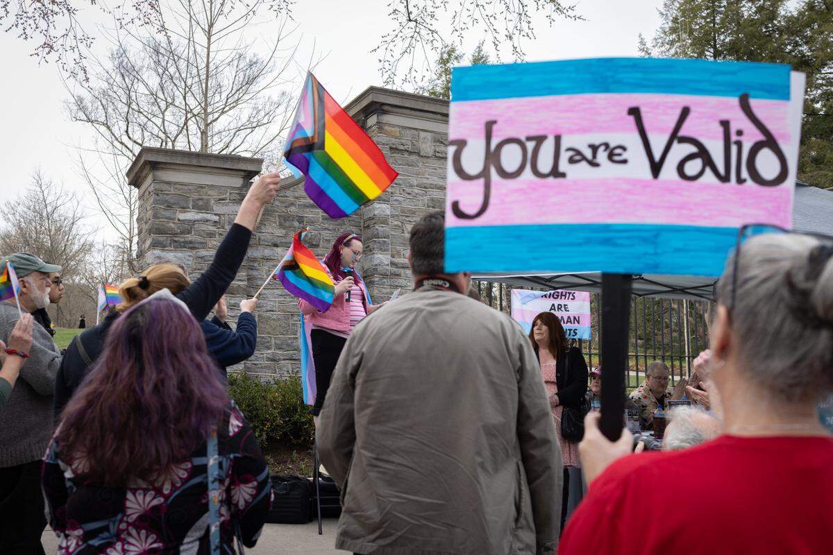 Michel Lee Garrett, a Centre LGBT+ board member, speaks during the Transgender Day of Visibility on March 31, 2025 at the Allen Street Gates.