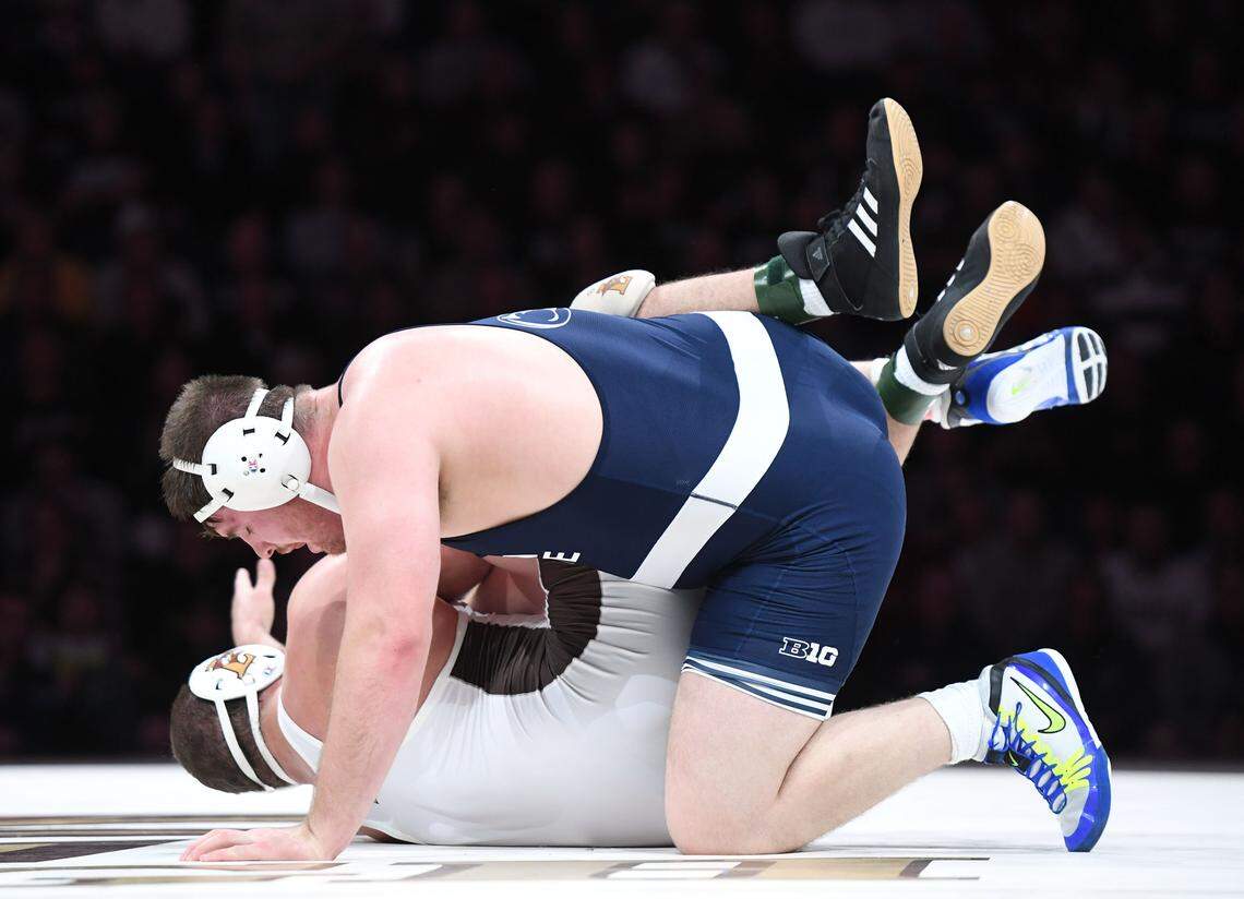 Penn State heavyweight Nick Nevills tries to turn Lehigh’s Jordan Wood over for a pin during the 2017 match at Lehigh in Allentown.  Nevills held on to win 2-0. Penn State defeated Lehigh, 23-19.