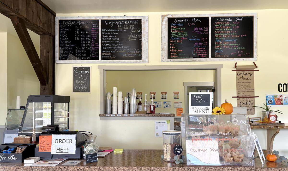 The menu and muffins at Kinfork Cafe on Oct. 2, 2025.  