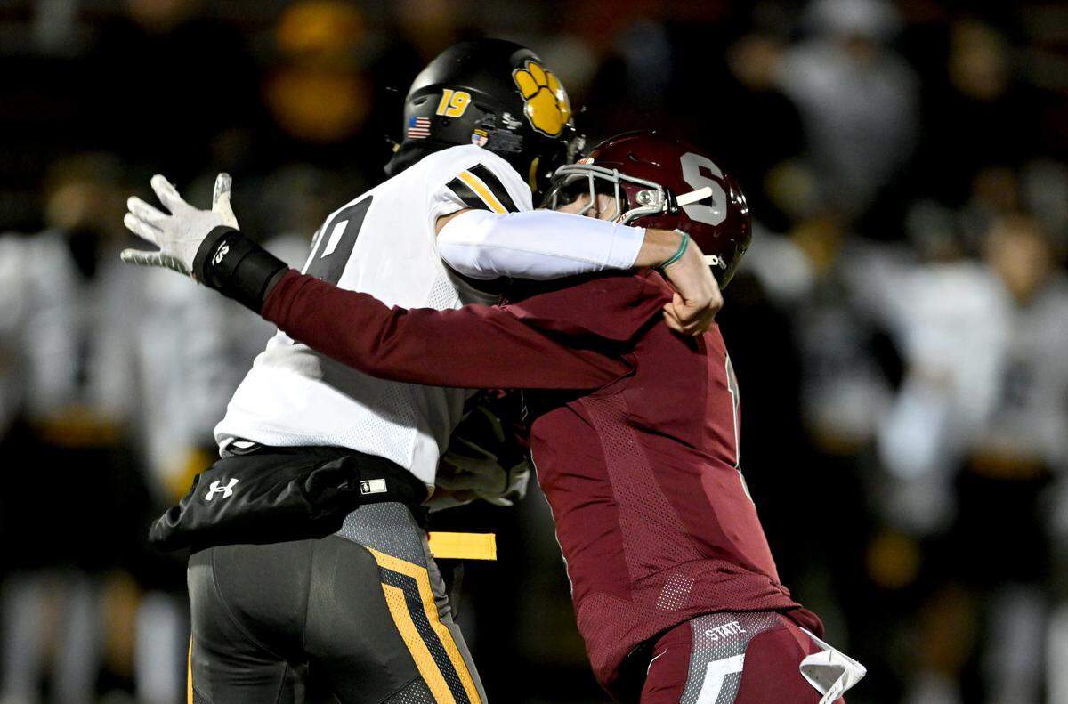 State College’s Will Stone stops North Allegheny’s Evan Lyon during the PIAA class 6A quarterfinals game on Friday, Nov. 25, 2022 at Memorial Field.