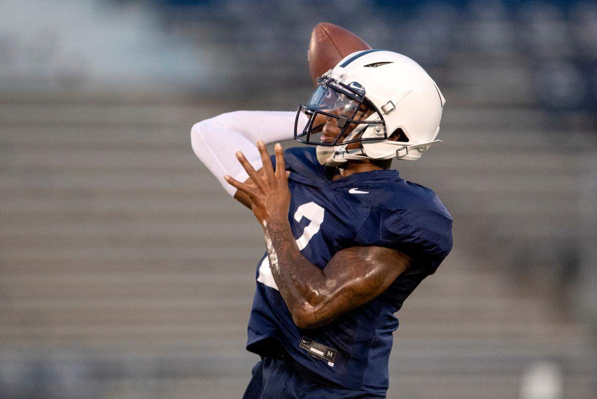 Penn State quarterback Ta’Quan Roberson makes a pass during practice on Wednesday, Aug. 25, 2021 in Beaver Stadium.