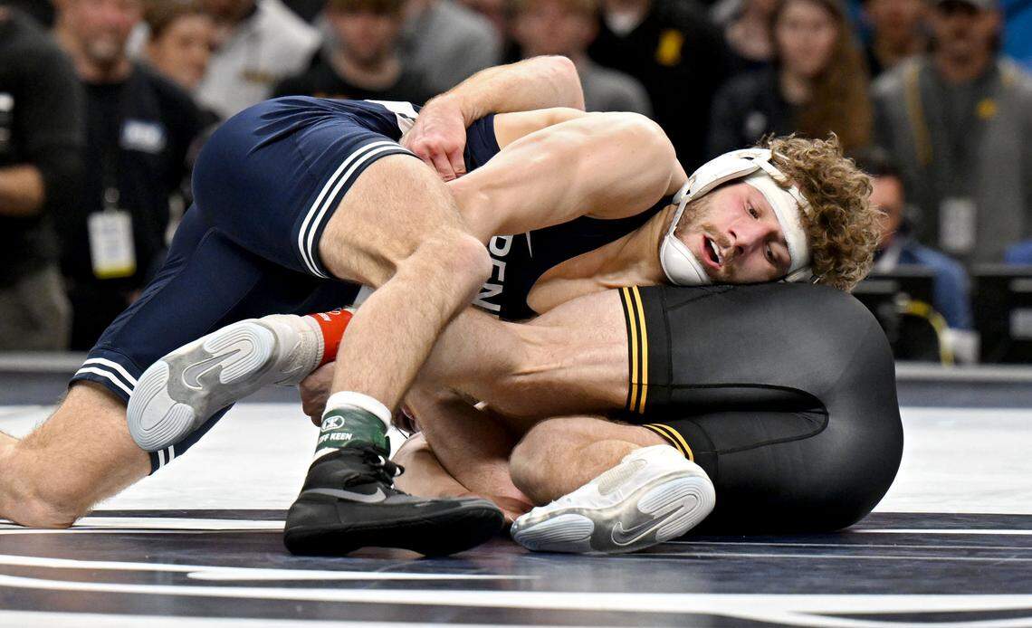 Penn State's Mitchell Mesenbrink controls Iowa’s Mikey Caliendo in the 165-pound championship bout of the Big Ten wrestling championships on Sunday, March 8, 2026.  