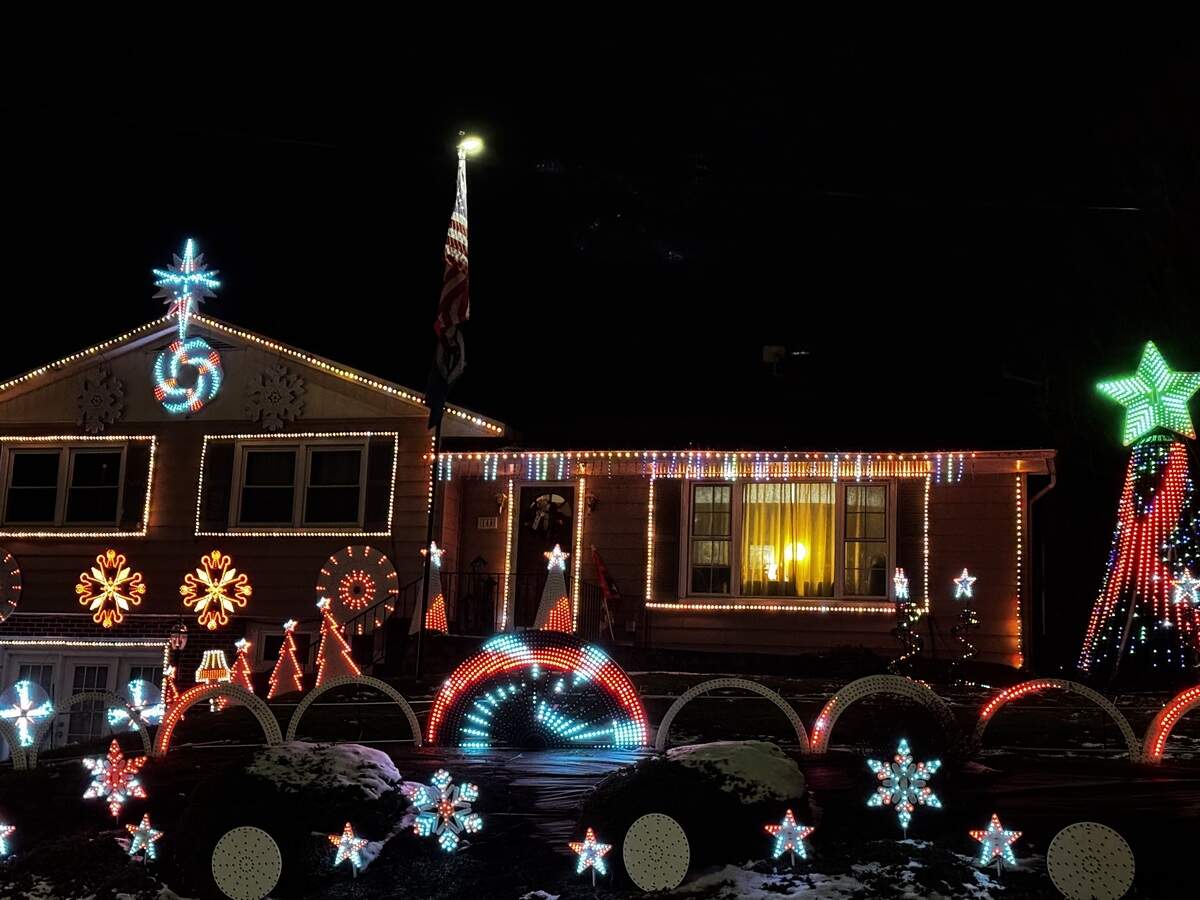 An animated light show plays at 144 E. Main St., Millheim, on Dec. 6, 2025.
