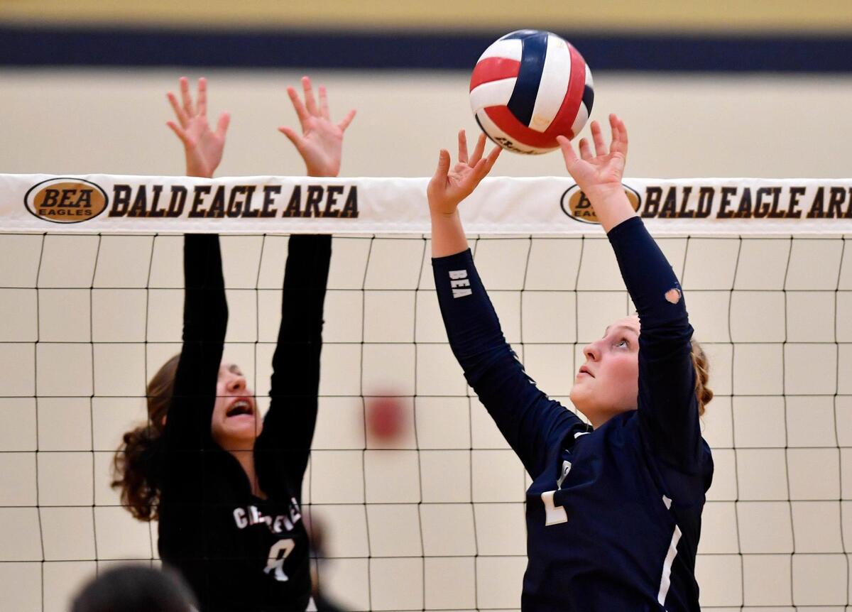Bald Eagle Area’s Madison Eckely sets the ball during the match against Clearfield on Thursday, Oct. 1, 2020.