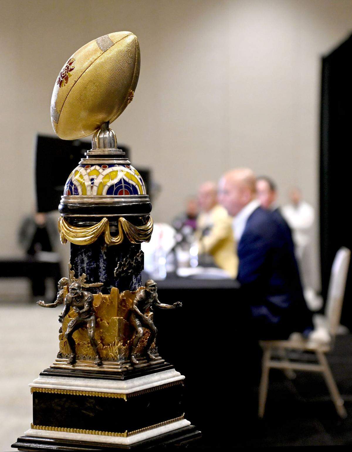 The Fiesta Bowl trophy on display as Penn State football coach James Franklin answers a question during a coaches press conference on Monday, Dec. 30, 2024 at the Camelback Inn.