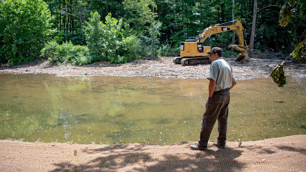 U.S. Fish and Wildlife biologist Mark Roberts stands on the new mud sill structure along the Bald Eagle Creek on Thursday, July 25, 2019. The Department of Government Efficiency announced the week of March 3, 2025, that it was terminating the State College area lease for the local field office for U.S. Fish and Wildlife. It is one of two State College area leases set to be terminated.