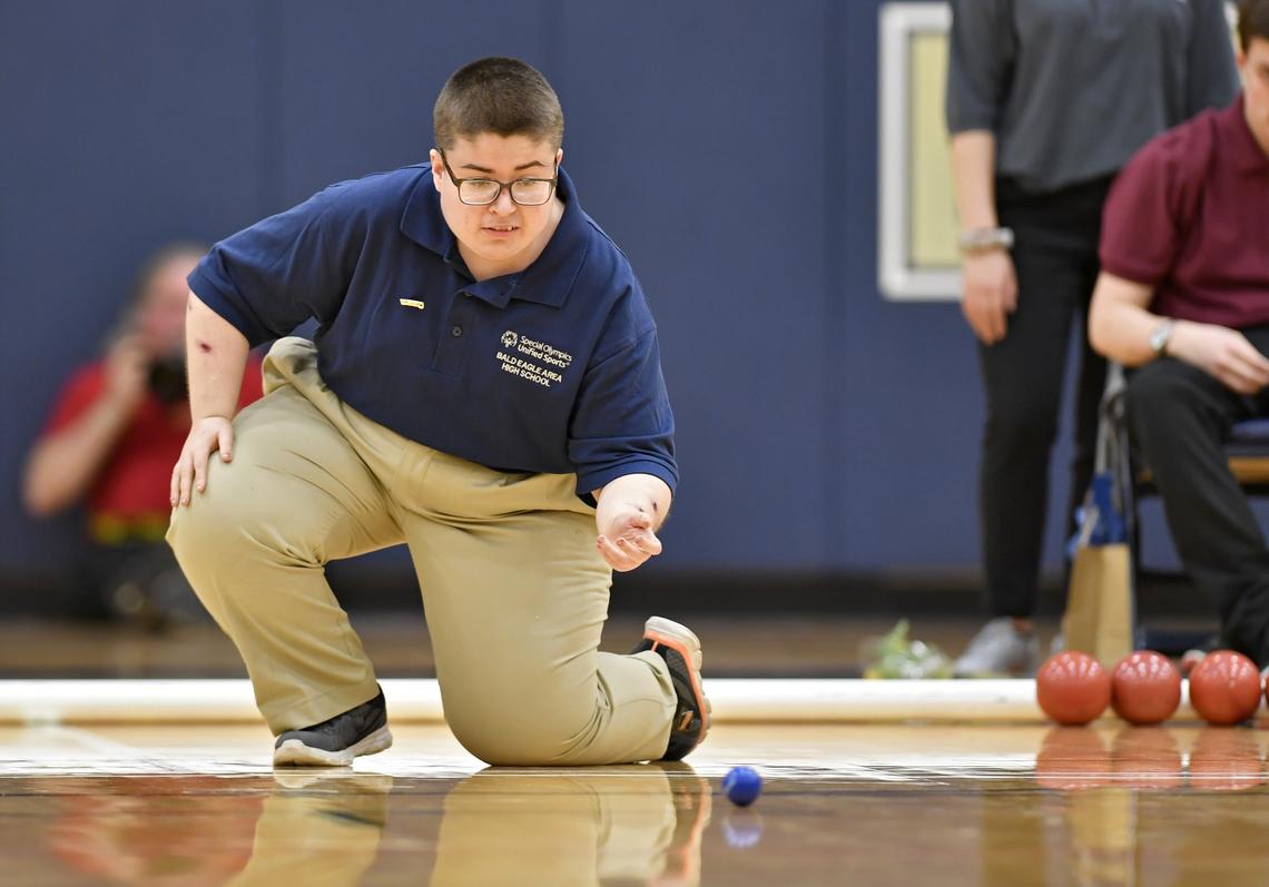 Bald Eagle Area’s Connor Roberts watches the ball as it rolls down the court Thursday during the unified bocce match against State College.
