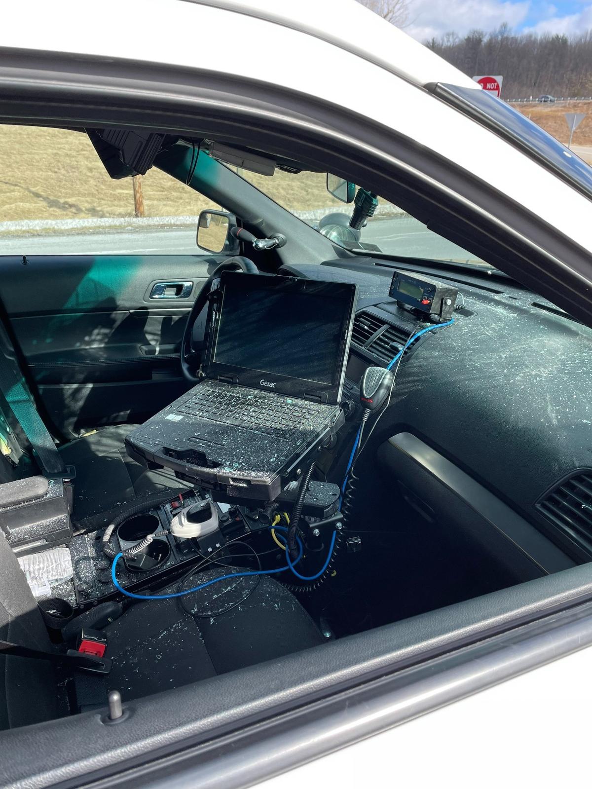 A pair of Spring Township police officers avoided injury Monday after a tire detached from a pickup truck and smashed into the windshield of their SUV.