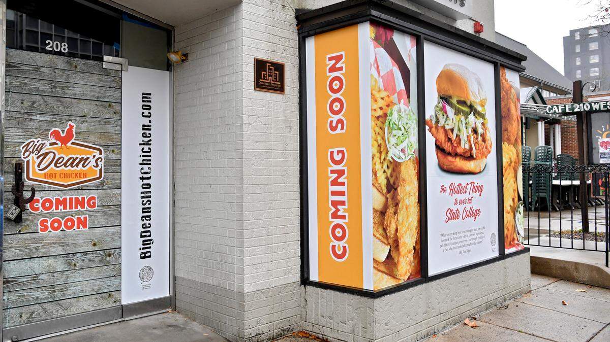 Signage at 208 West College Avenue in downtown State College promotes a new restaurant, Big Dean’s Hot Chicken.