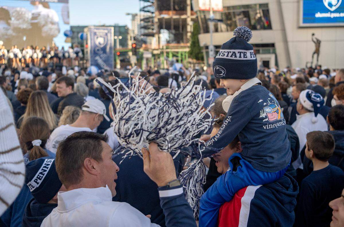 Gus Zayac, 5, cheers along with the thousands of Penn State fans at the pep rally hosted by the Penn State Alumni Association on Sunday, Jan. 1, 2023 at LA Live.