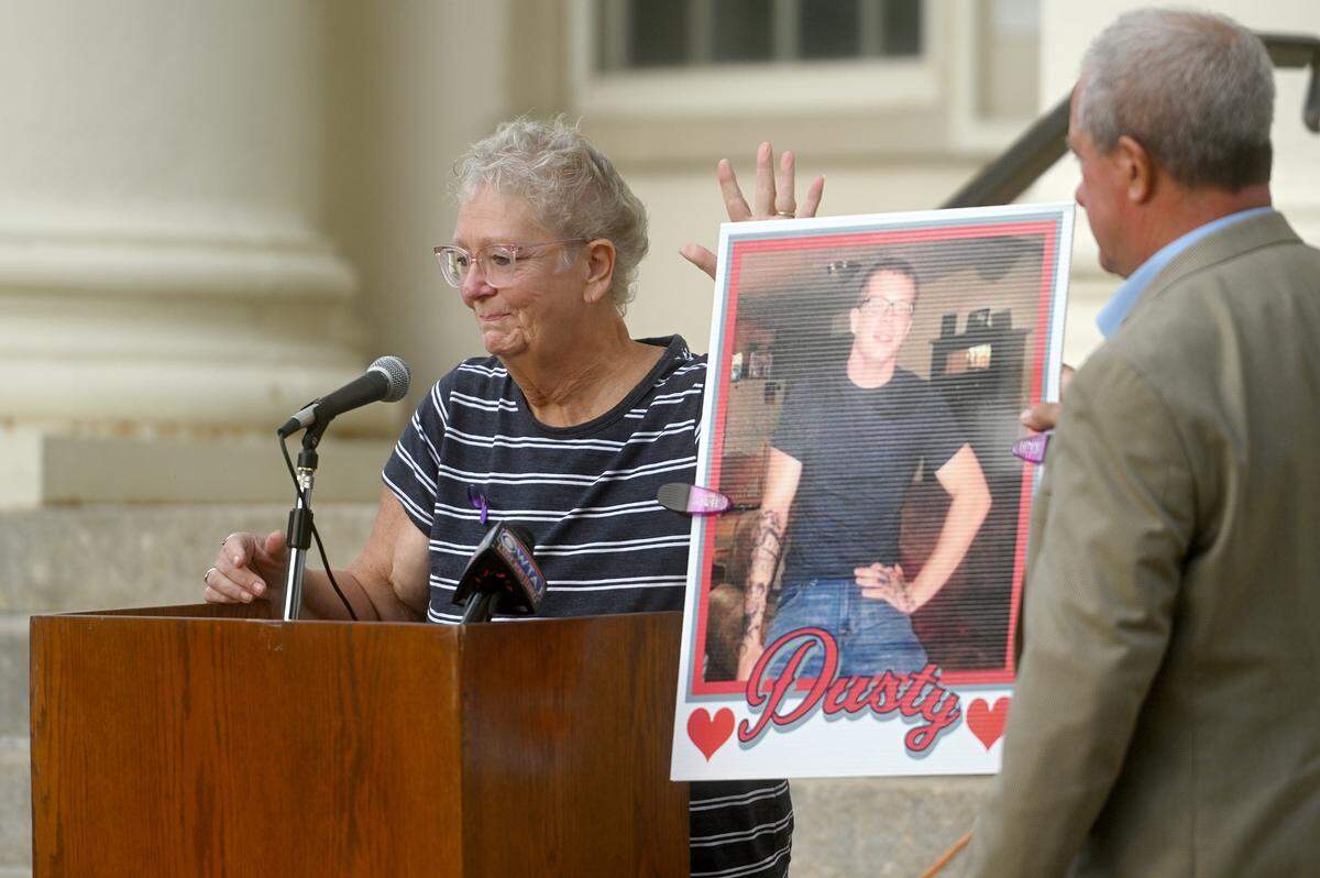 Melissa Grove talks about her grandson who died from an overdose during the Centre County HOPE Initiative candlelight remembrance ceremony on Wednesday, Aug. 30, 2023, outside of the Centre County Courthouse.