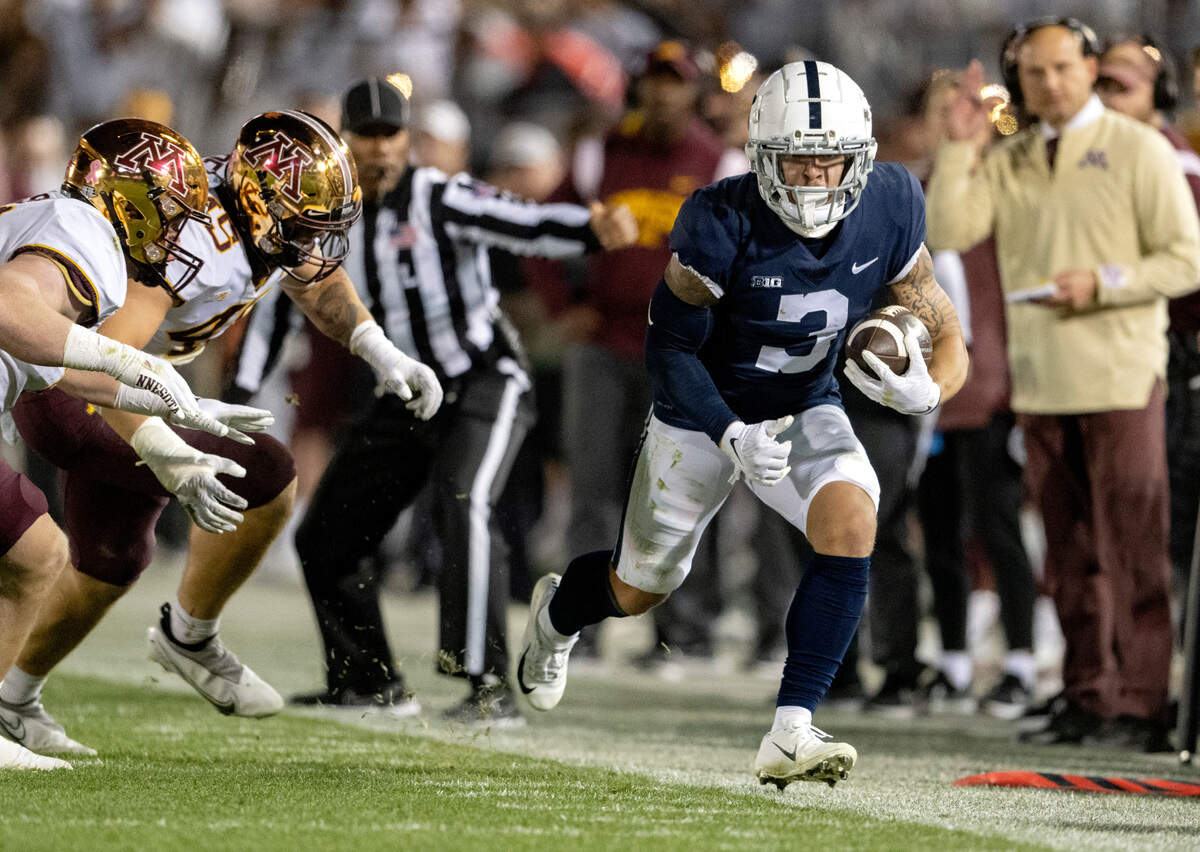 Minnesota defenders pressure Penn State wide receiver Parker Washington out of bounds during the game on Saturday, Oct. 22, 2022.