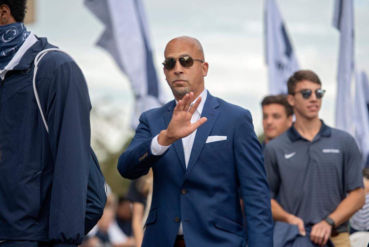 Penn State football coach James Franklin waves to fans as he arrives for the game against Indiana.