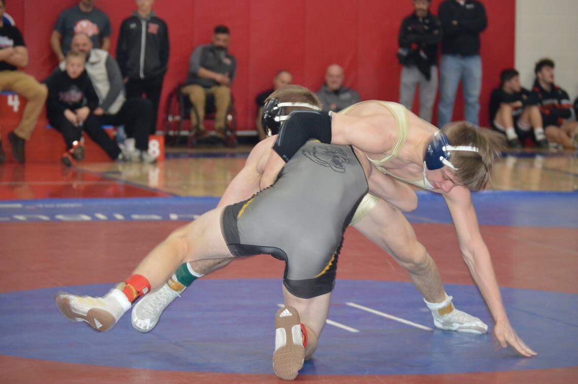 Bald Eagle Area’s Coen Bainey fights off a takedown attempt from Bentworth’s Chris Vargo in their 120-pound title match of the Ultimate Warrior Tournament on Saturday at West Branch High School in Allport. Bainey used a last second reversal to top Vargo, 2-1.