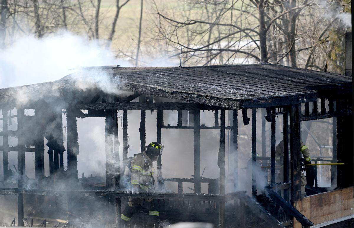 Firefighters respond to a fire at home on the 4000 block of Nittany Valley Drive in Walker Township on Tuesday, Dec. 20, 2022.