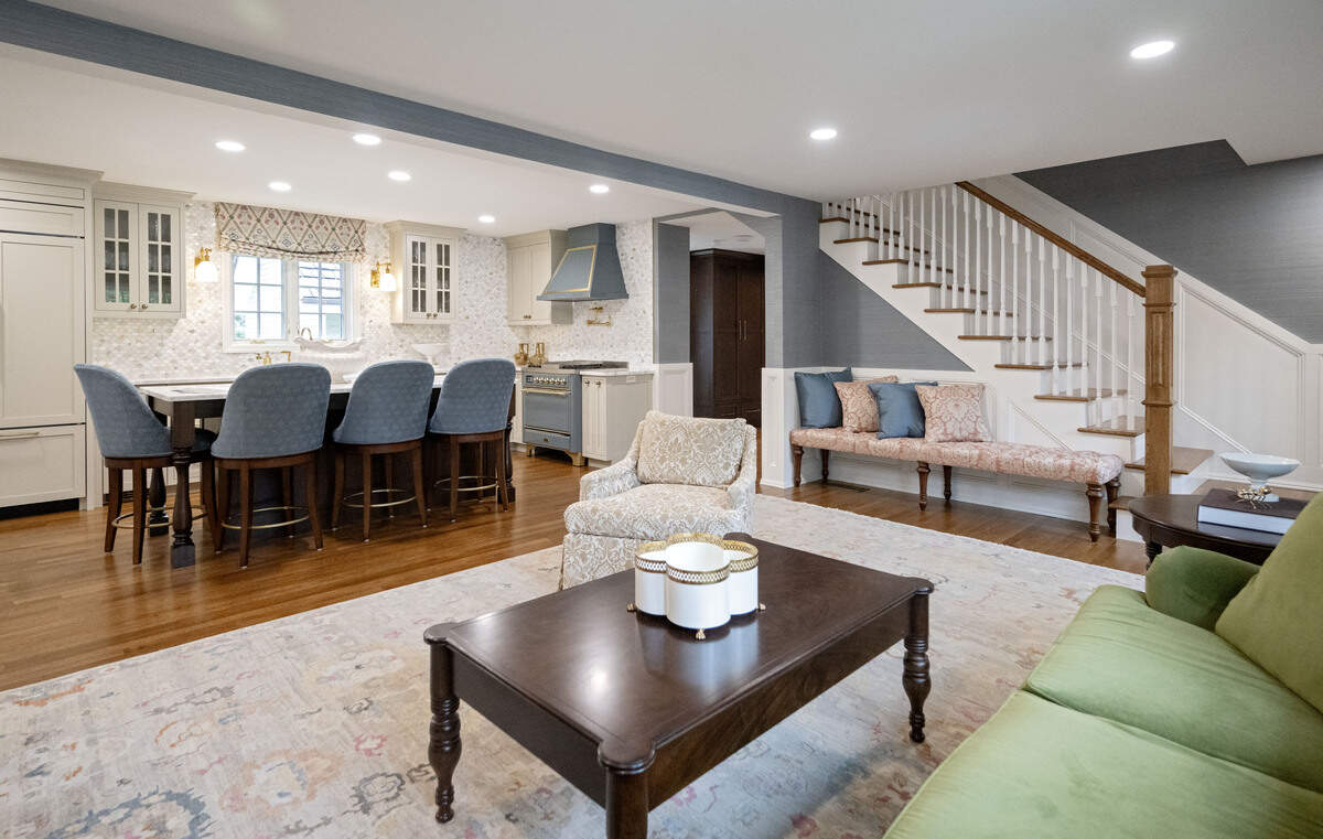 The living room that opens into the kitchen at 619 McKee St. in College Heights, Sept. 25, 2025. 
