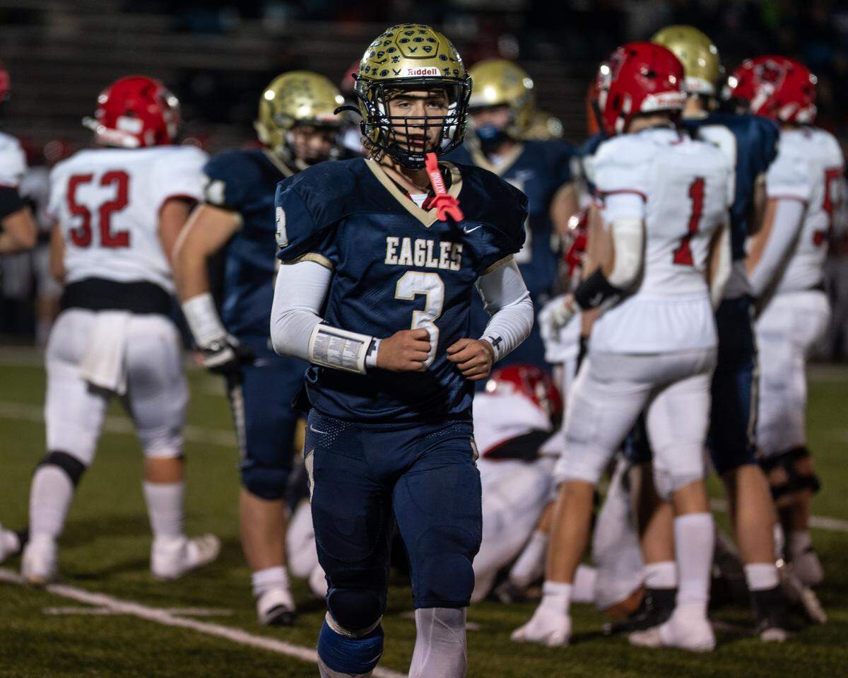 Bald Eagle Area senior quarterback Grady Fisher (3) runs to the sideline during a Friday night football game against Central Cambria in Wingate, Pa., on Oct. 24, 2025. The Eagles beat the Red Devils 21-0.
