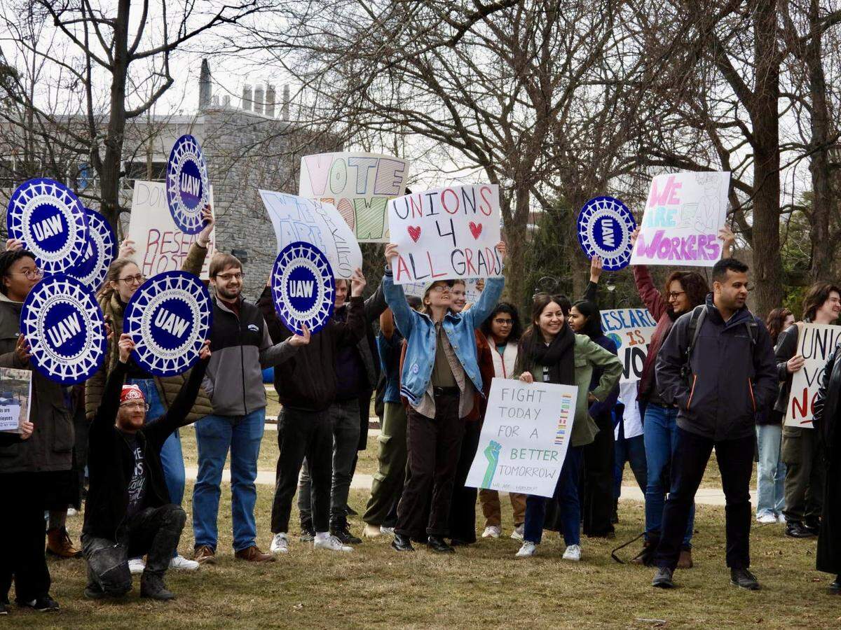 Graduate students at Penn State who want to unionize held a rally at Old Main on Tuesday.