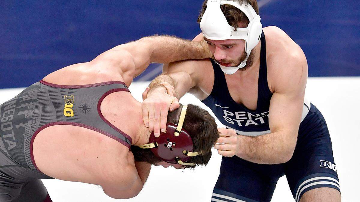 Minnesota’s Brayton Lee tries to fight off Penn State’s Brady Berge in the 157 lb bout during the 2021 Big Ten Wrestling Tournament at the Bryce Jordan Center in State College, Pa, on Sunday, March 7, 2021. Berge announced Thursday he will be leaving his post as an assistant coach at South Dakota State to rejoin the Penn State wrestling team.
