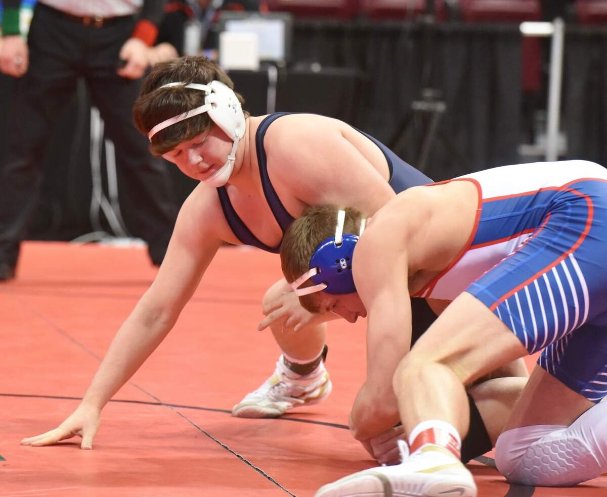 Philipsburg-Osceola’s Parker Moore is pinned by Mount Pleasant’s Dayton Pitzer in :33in the 215-pound finals of the PIAA West Class 2A Super Regional on Saturday, March 6, 2021, at the Kovalchick Convention and Athletic Complex at Indiana University of Pennsylvania.
